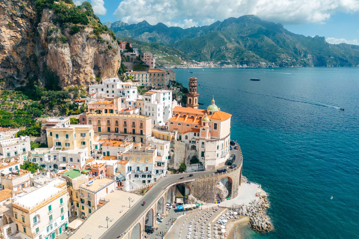 aerial side view of Atrani, Italy along Amalfi Coast