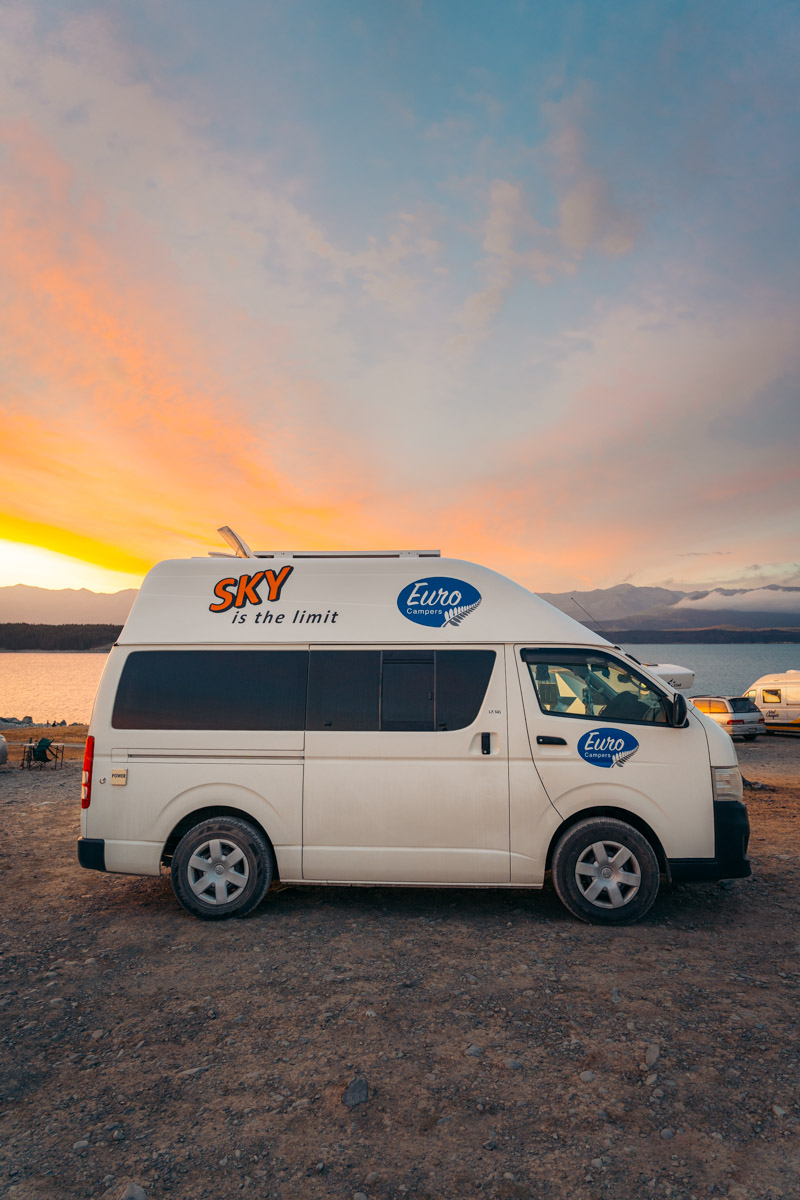 Euro Campers Sky campervan at Lake Pukaki overnight camping under pink sunset in New Zealand